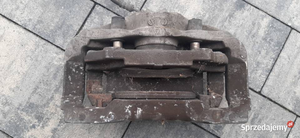 Zacisk prawy przód BMW F10 F11 345 6031 małopolskie