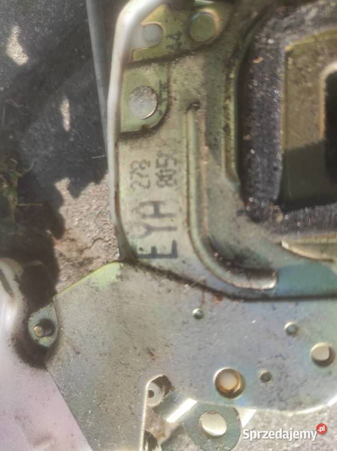 zamek drzwi nissan primera p10 z silownikiem