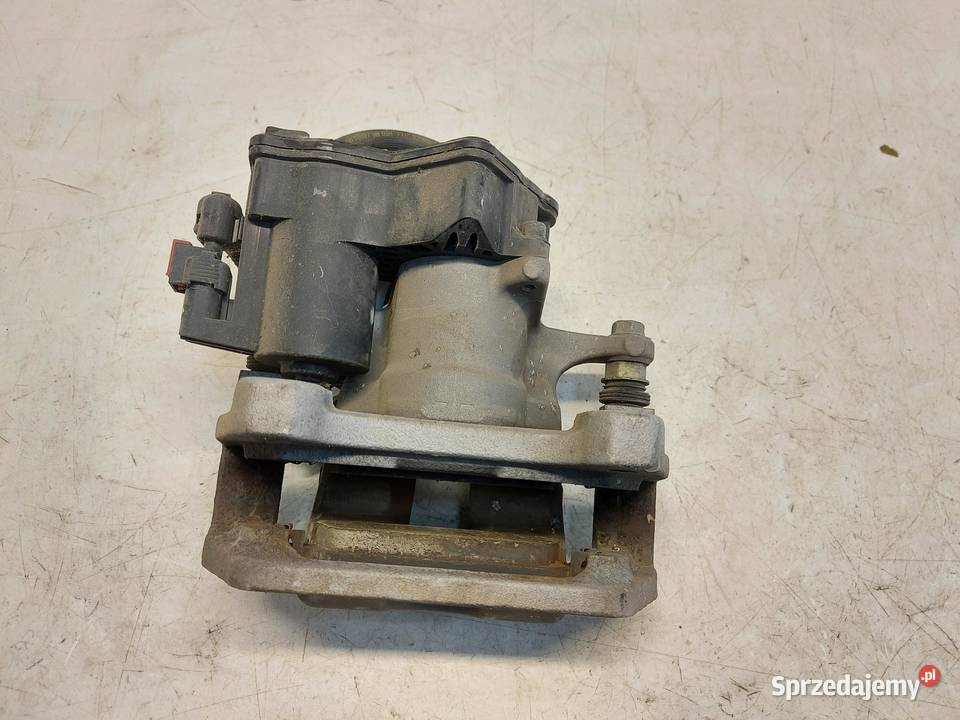 TESLA MODEL Y 2022r ZACISK HAMULCOWY PRAWY TYŁ