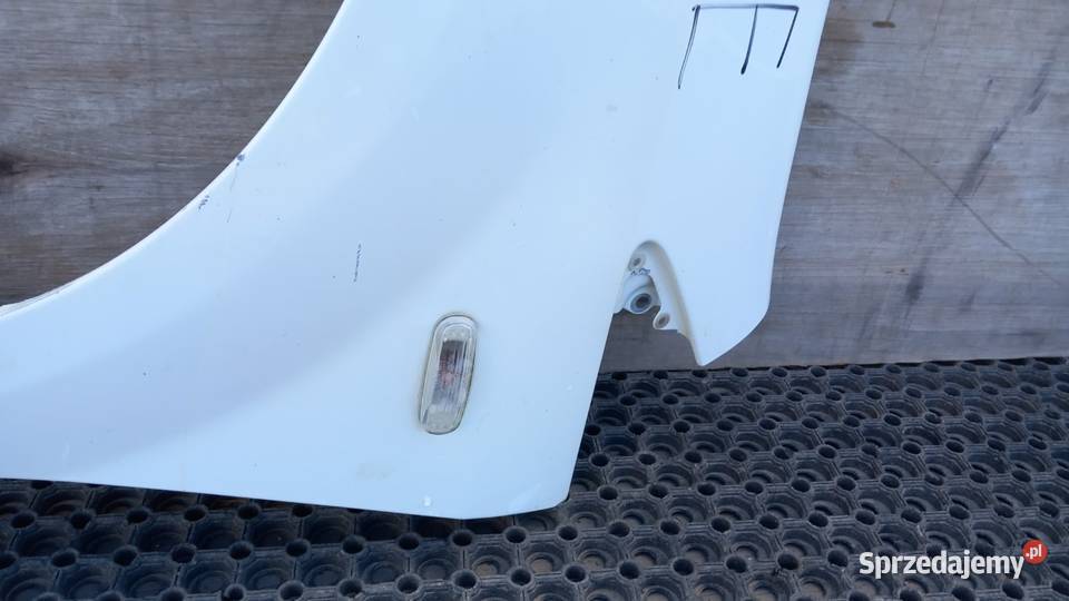 FIAT GRANDE PUNTO BŁOTNIK PRZÓD LEWY 296 Błotniki wielkopolskie Zbierkowo