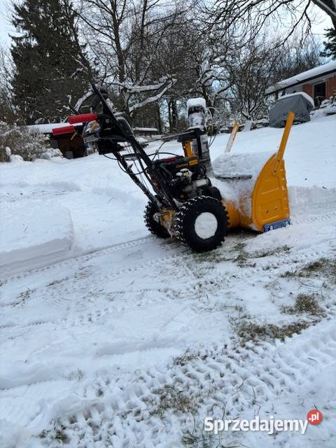 Odśnieżanie odśnieżarką spalinową usługa