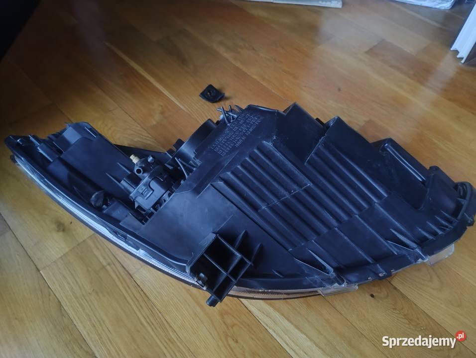 Mazda 2 0714 lampa reflektor lewa przednia przód osobowe wielkopolskie