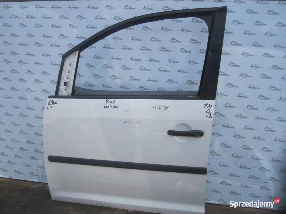 VW CADDY III LIFT 09r drzwi lewe przód Drzwi