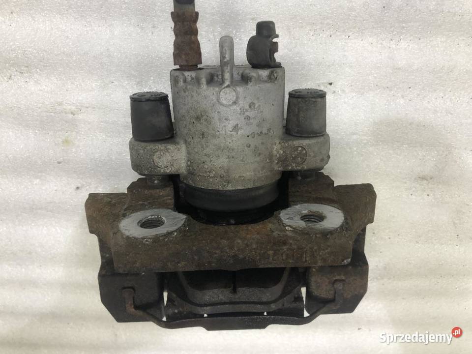 ZACISK HAMULCOWY LEWY TYŁ BMW E60 osobowe