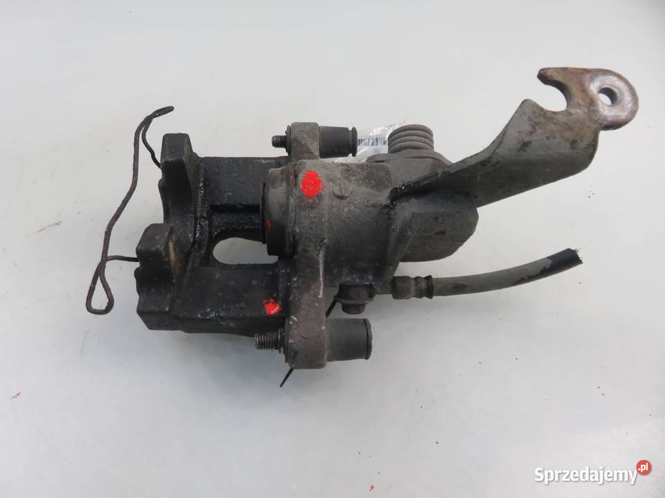 ZACISK PRAWY TYŁ NISSAN PRIMERA P12 osobowe