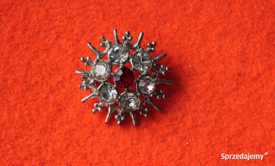 Stara angielska broszka śnieżynka z czerwonym Ochojno