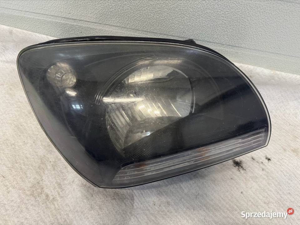 Lampa prawy przód Kia Sportage II lift 0708