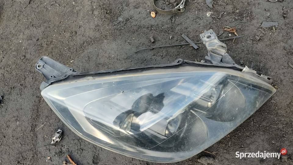 Reflektor lampa lewa prawa przód przednia Opel osobowe Książ Wielkopolski