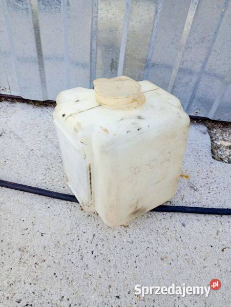 Zbiorniczek spryskiwacza z pompką MTZ Sędziszów