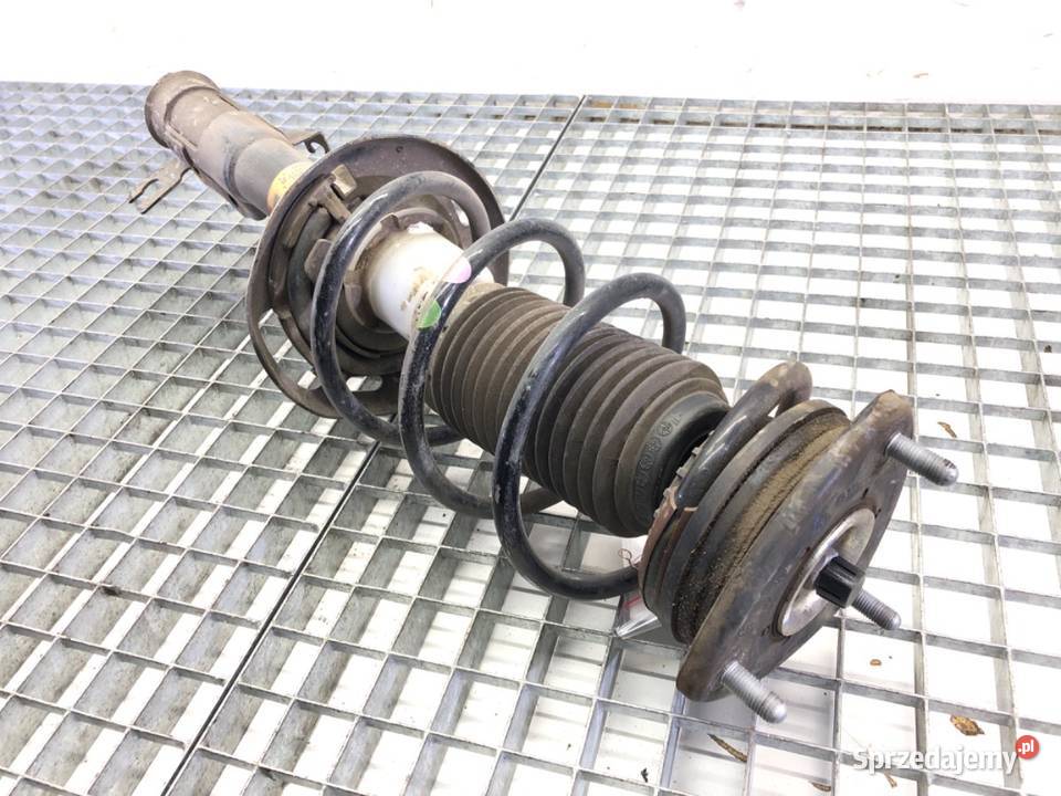 AMORTYZATOR LEWY PRZÓD SPRĘŻYNA MAZDA 2 DL 15