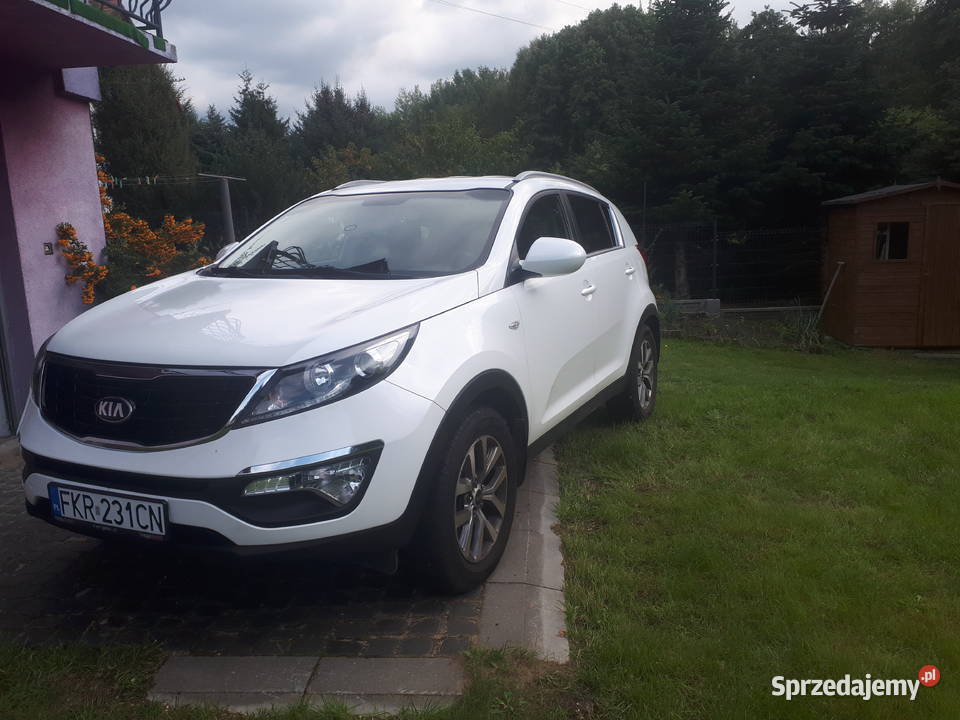 Kia Sportage 16 benzyna Biala perła komplet opon Połupin sprzedam