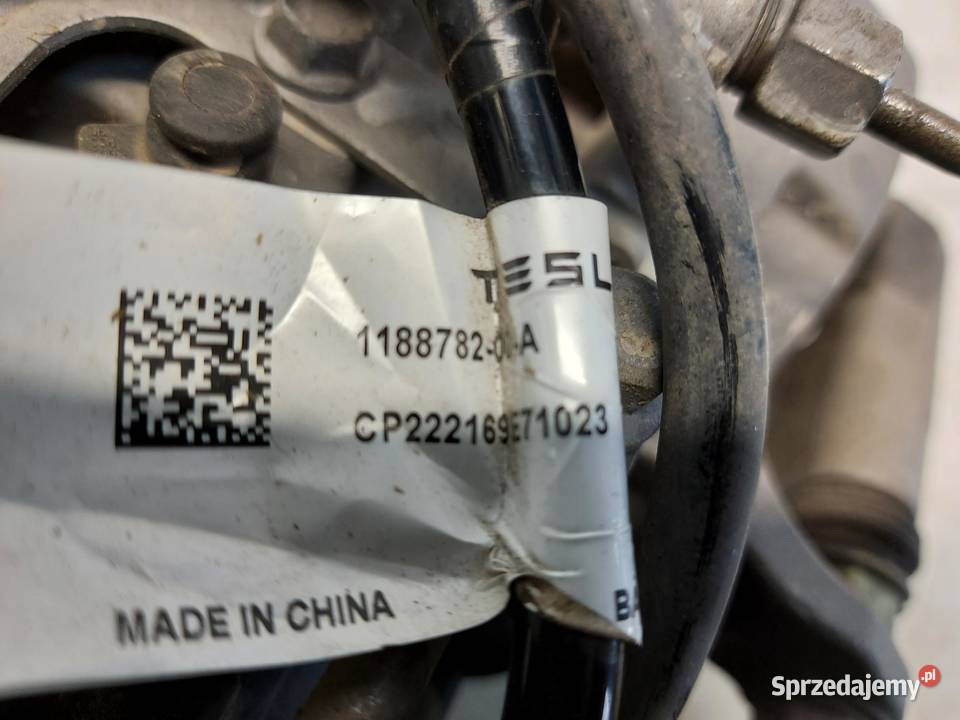 TESLA MODEL Y 2022r ZACISK HAMULCOWY PRAWY TYŁ dolnośląskie