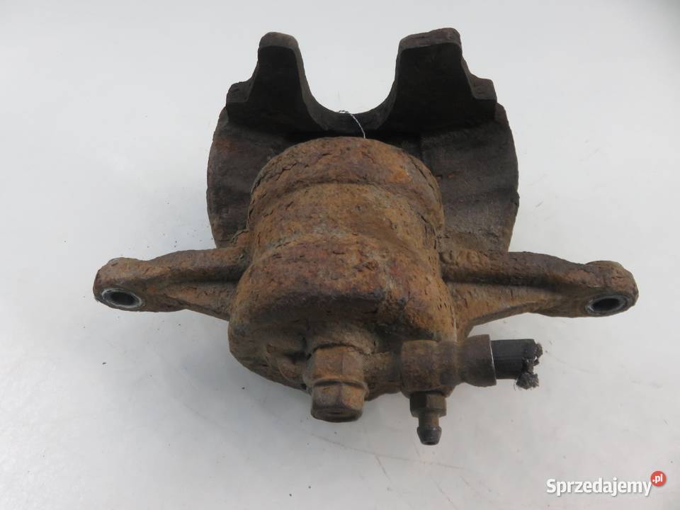 ZACISK LEWY PRZÓD TOYOTA AVENSIS II 20 D4D małopolskie
