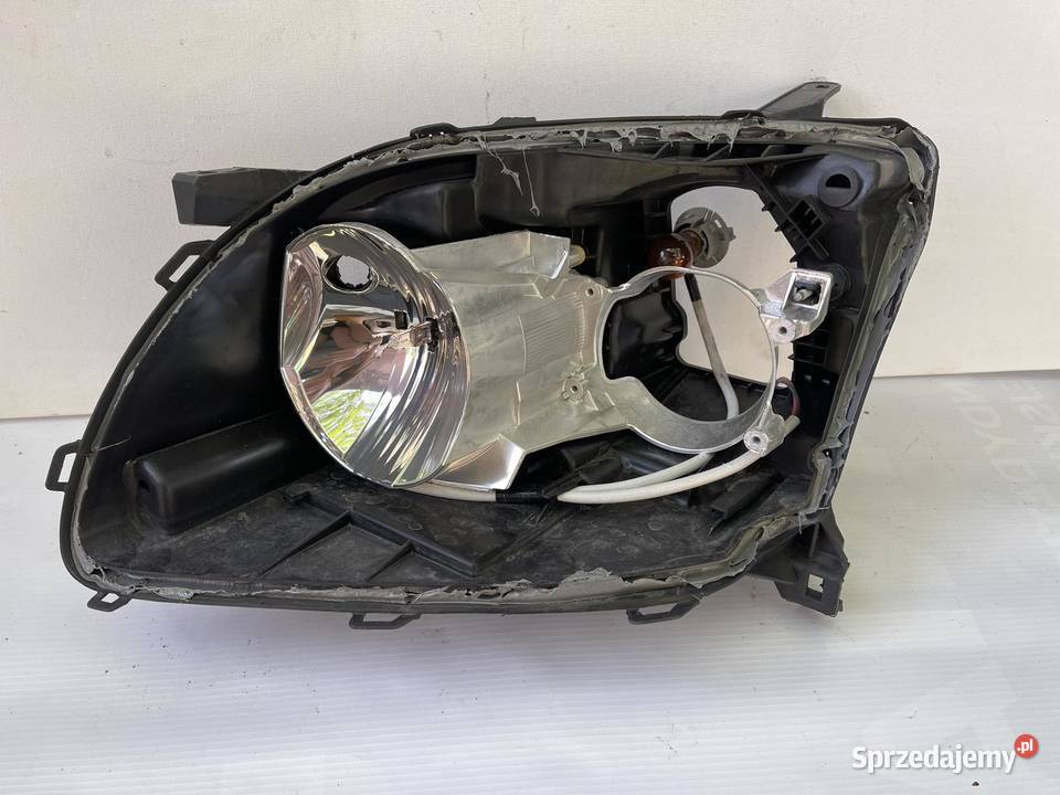 TOYOTA AVENSIS T25 LEWA OBUDOWA LAMPY ZWYKŁEJ