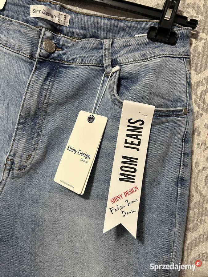 Jasnoniebieskie dżinsy Mom Fit 48