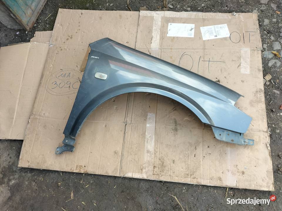 NISSAN PRIMERA P12 BŁOTNIK PRAWY PRZÓD