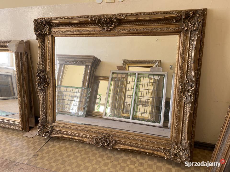 Ogromne kryształowe lustro w rzeźbionej ramie