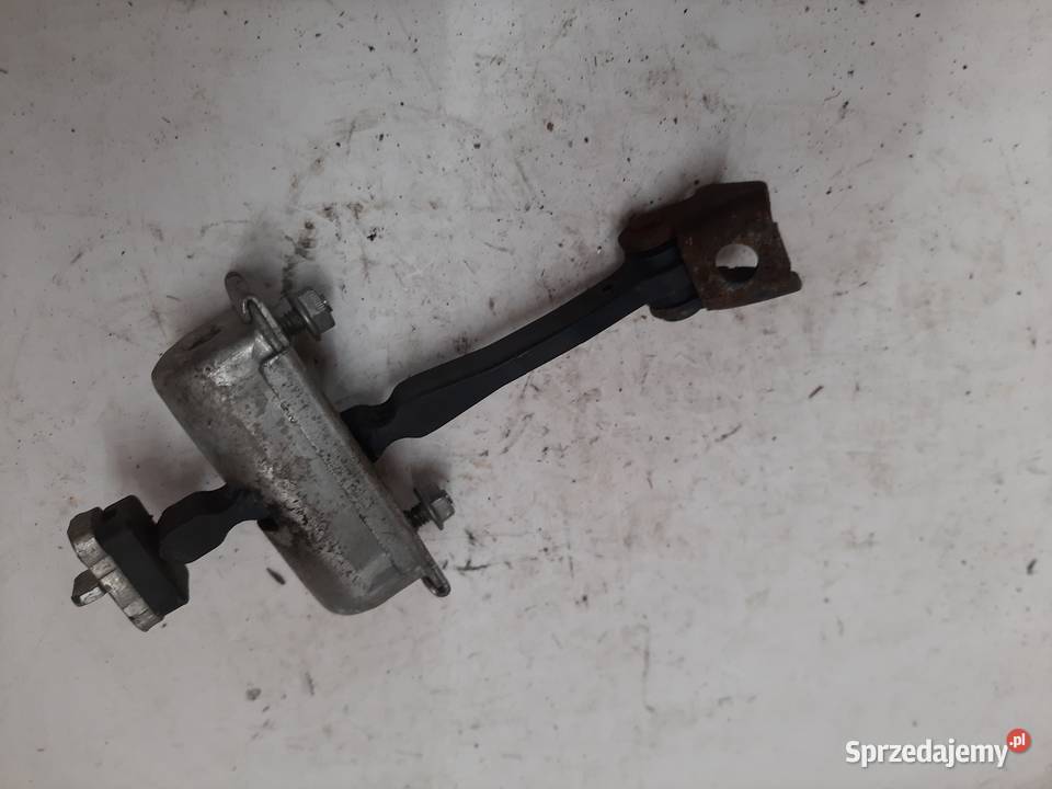 Opel Corsa D 5 D Lewy Przedni ogranicznik drzwi osobowe Ksawerów