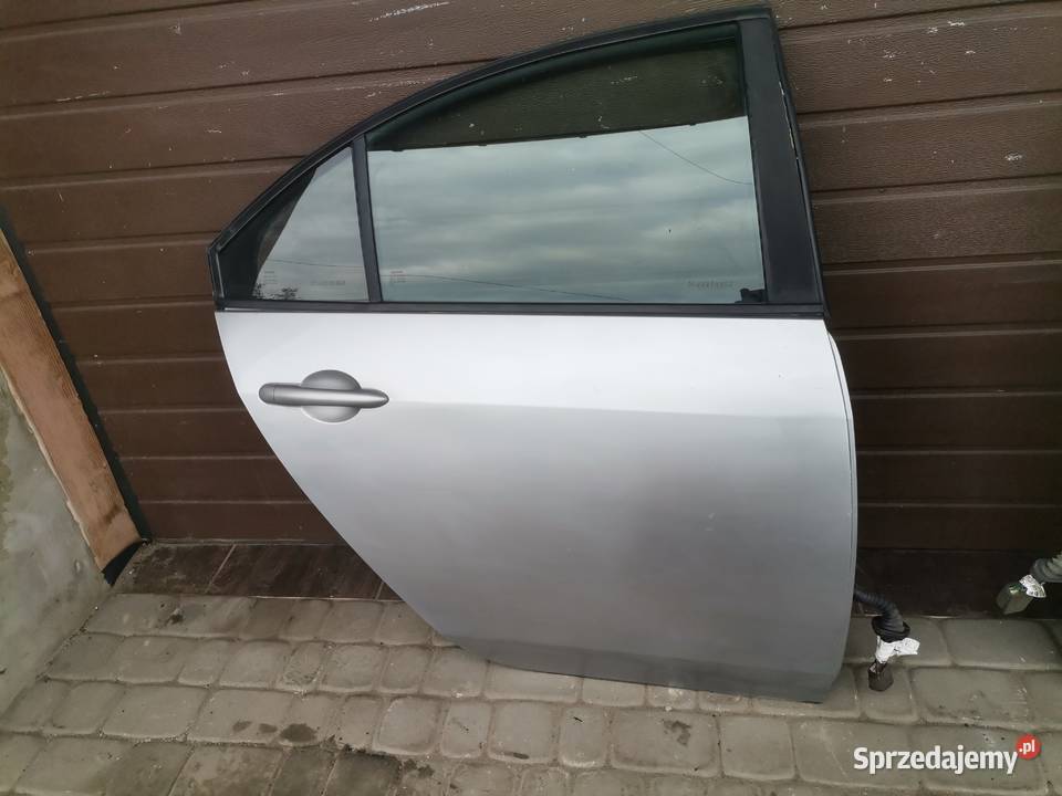 NISSAN PRIMERA P12 HB DRZWI PRAWY TYŁ KY0G Nowy Sącz