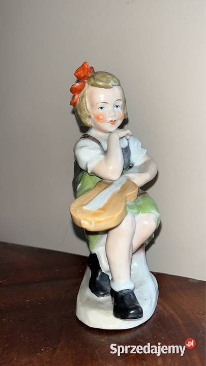 Śliczna Figurka dziewczynki z gitarą Bez Gdańsk