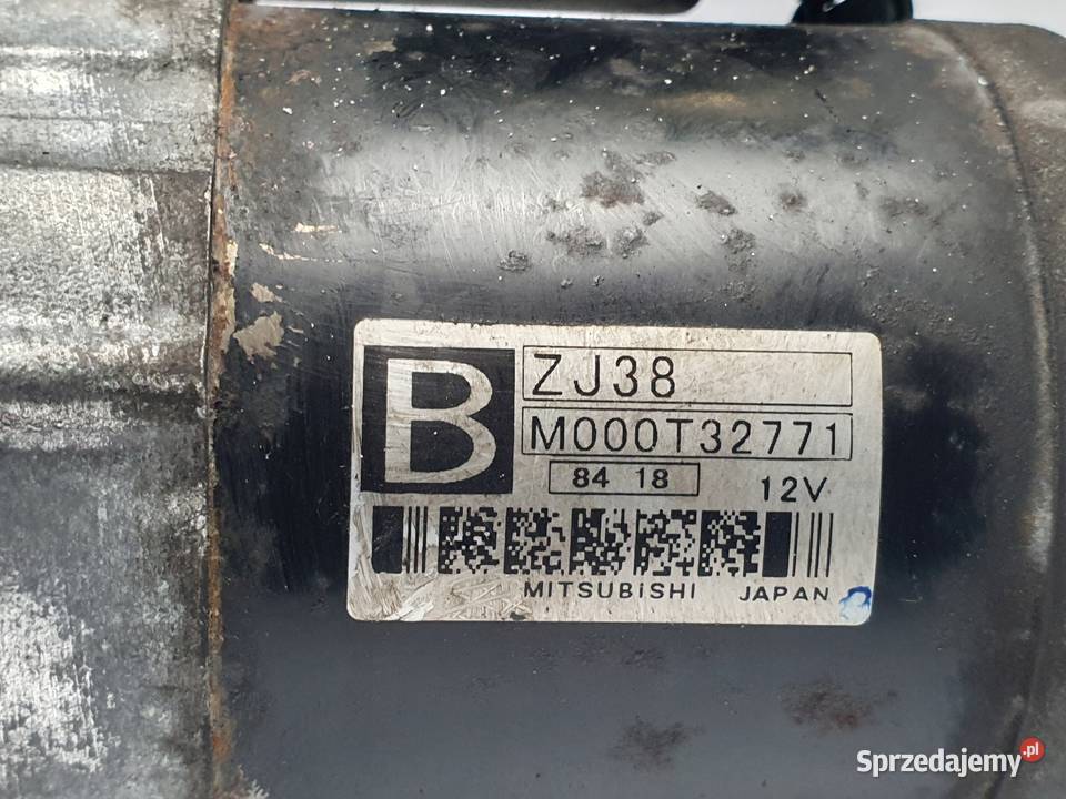 ROZRUSZNIK Mazda II 13 16V oryginał M000T32771 Motoryzacja