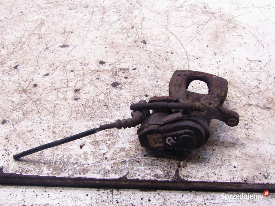 ZACISK HAMULCOWY PRAWY PRAWA TYLNY 16 DCI NISSAN osobowe