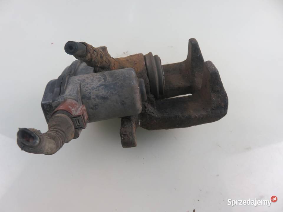 ZACISK LEWY TYŁ AUDI A4 B8 18 TFSI małopolskie sprzedam