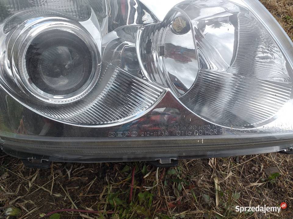 Lampa lewa Toyota 21211f3r 2004 Lampy przednie