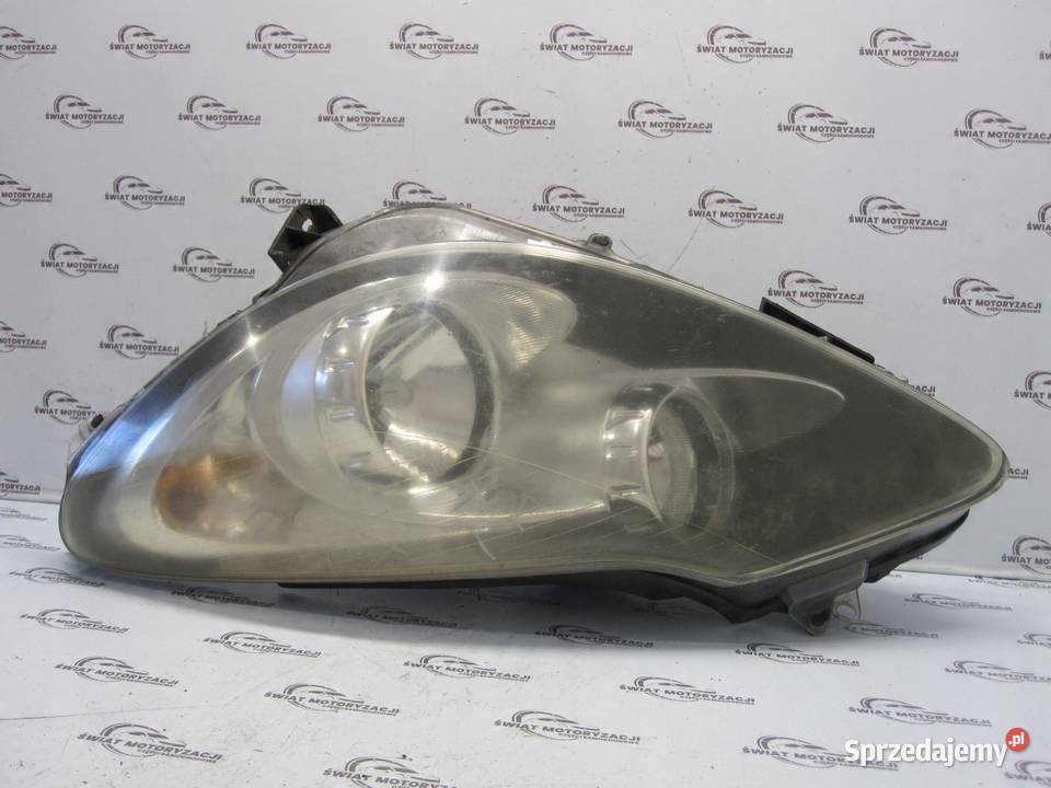 OPEL CORSA D lampa lewa przód 89391389 89391377