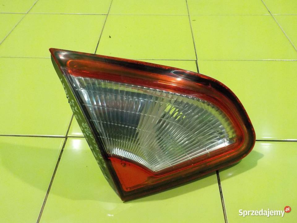 NISSAN QASHQAI J10 LIFT 10r 5D lampa lewa tyl w Suków