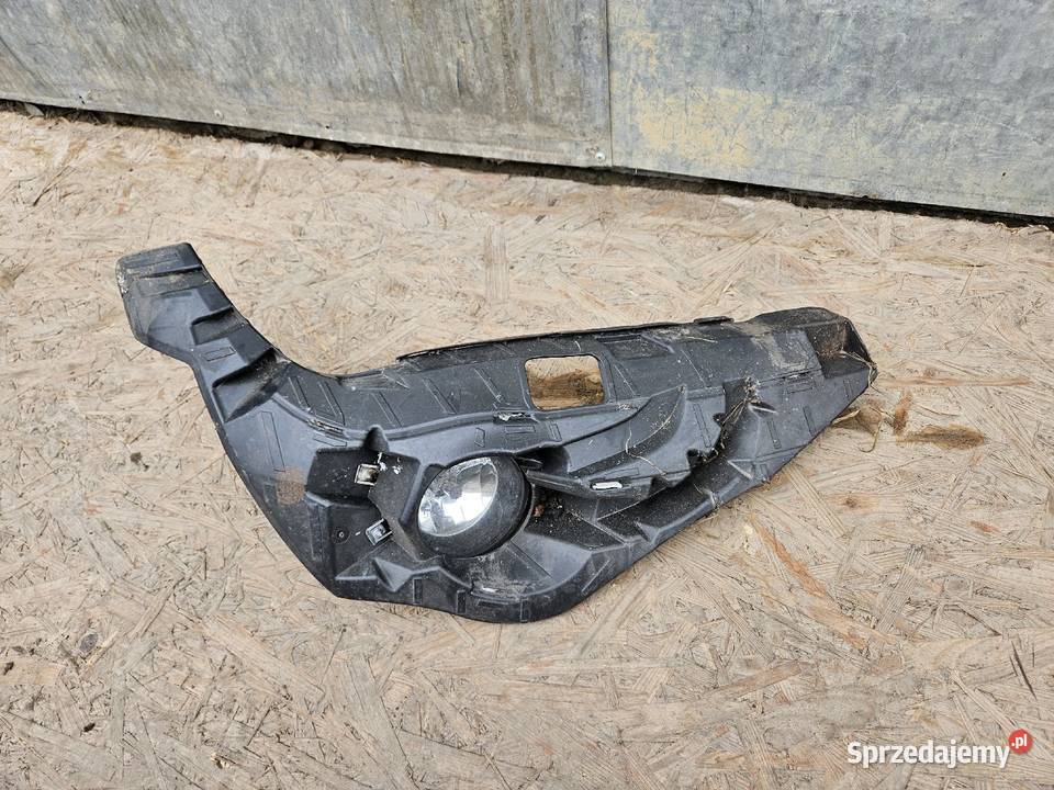 BMW X1 E84 ŚLIZG HALOGEN PRAWY PRZÓD 7303794