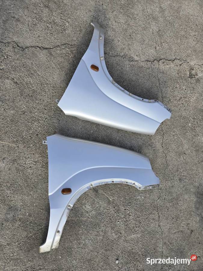 Suzuki Ignis FH 0003 błotnik błotniki przednie