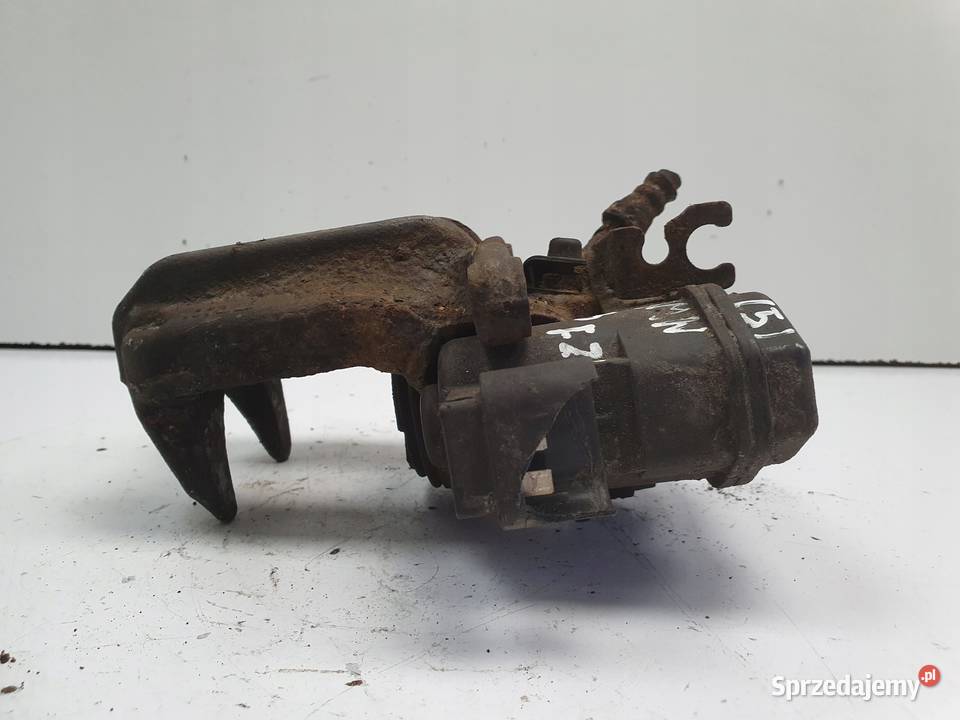 BMW X3 F25 TYLNY ZACISK HAMULCOWY lewy tył Rudka