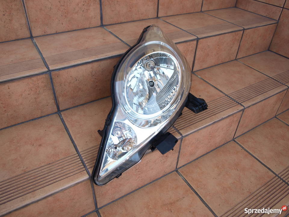 Peugeot 107 lampa lewa 2005 2014r europa Lewe Oświetlenie wielkopolskie Kalisz