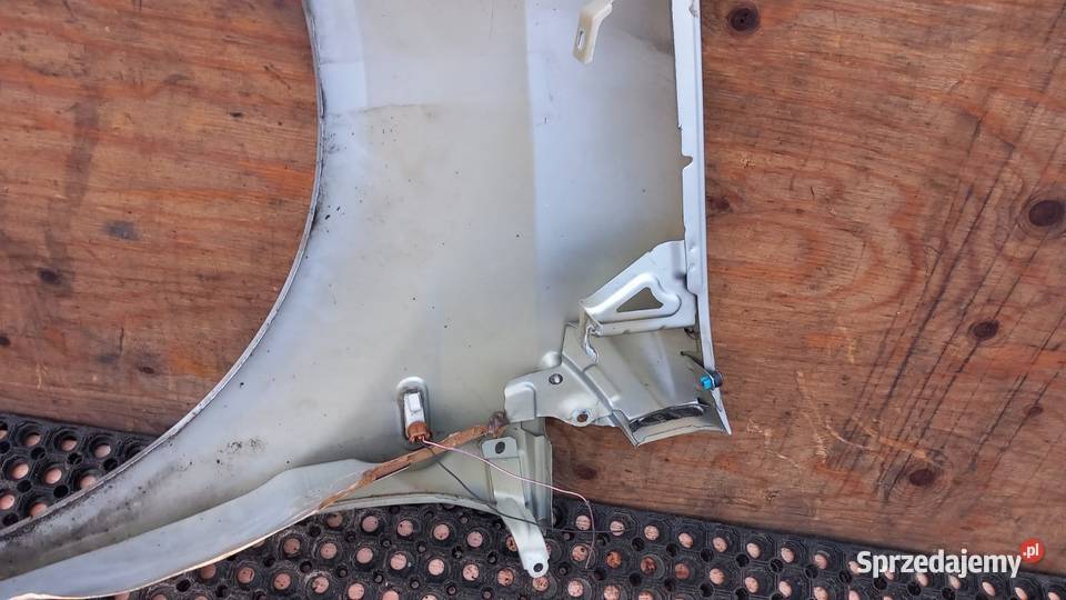 FIAT GRANDE PUNTO EVO BŁOTNIK PRZÓD PRAWY 457B Zbierkowo