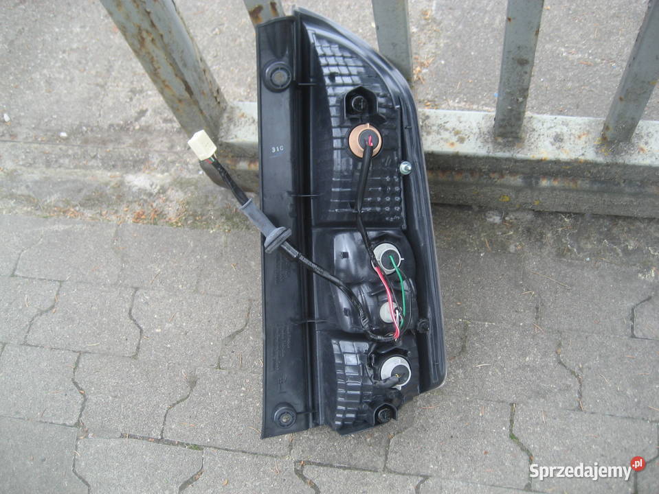 daihatsu sirion II 0510r lampa tył lewa koito wielkopolskie