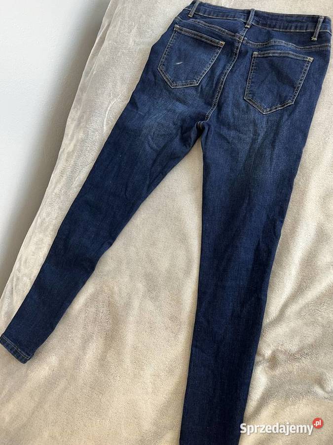 Jeansy dżinsy skinny niebieskie z czerwonymi podkarpackie