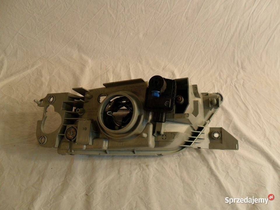 Reflektor Przód strona lewa Mitsubishi Pajero Nowy Tomyśl