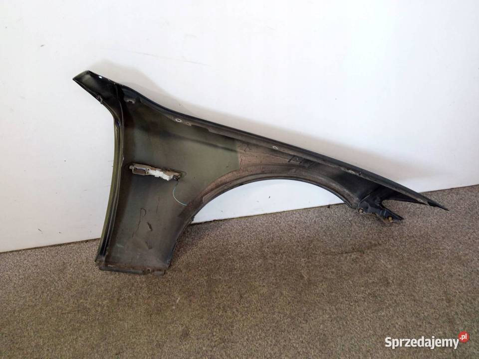 BŁOTNIK LEWY PRZÓD 668 Bmw Seria 5 VI 2010