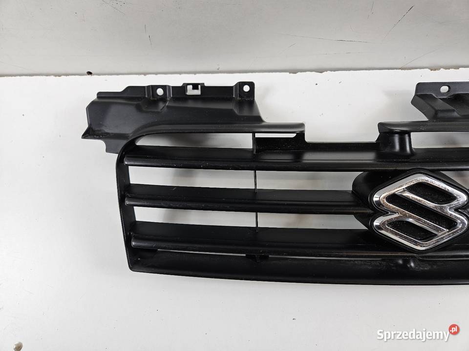 SUZUKI IGNIS I 0006 GRILL ATRAPA ZDERZAKA PRZÓD Międzychód