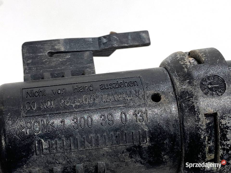 SPRYSKIWACZ REFLEKTORA PRAWY PRZÓD BMW F07