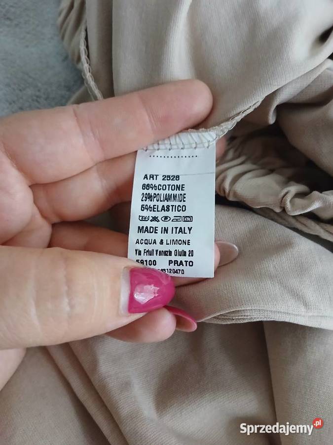 Damskie spodnie eleganckie z szeroką nogawką Miejsce Piastowe
