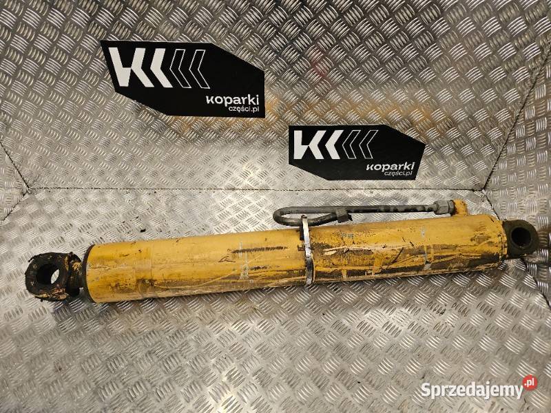 Siłownik główny tylnego ramienia Holland LB110 Układ hydrauliczny