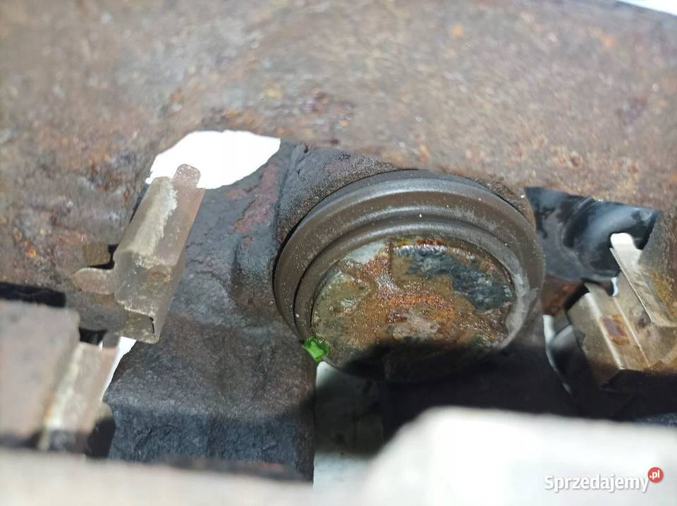 ZACISK HAMULCOWY LEWY TYŁ 32 FSI ELEKTRYCZNY sprzedam