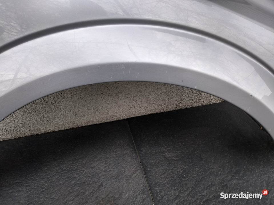 Opel Astra H błotnik przedni lewy srebrny Z157 Sieradz