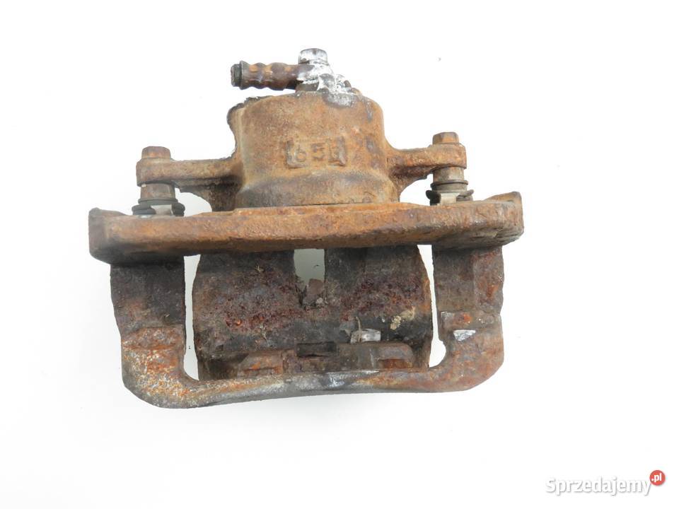 ZACISK LEWY PRZÓD TOYOTA RAV 4 III 20