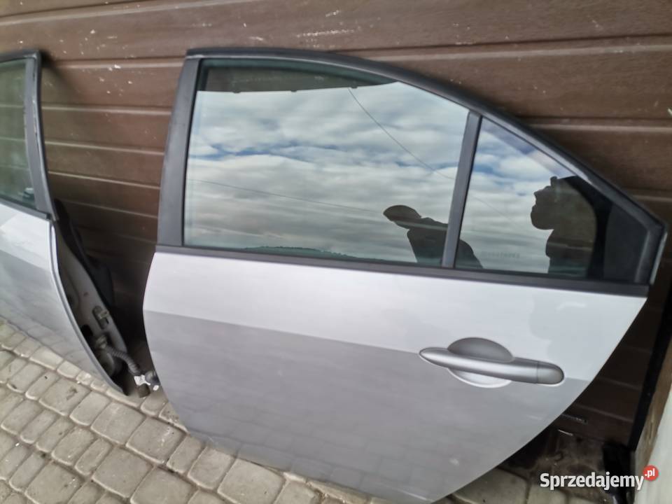 NISSAN PRIMERA P12 HB DRZWI LEWY TYŁ KY0G Rok produkcji 2005 Nowy Sącz