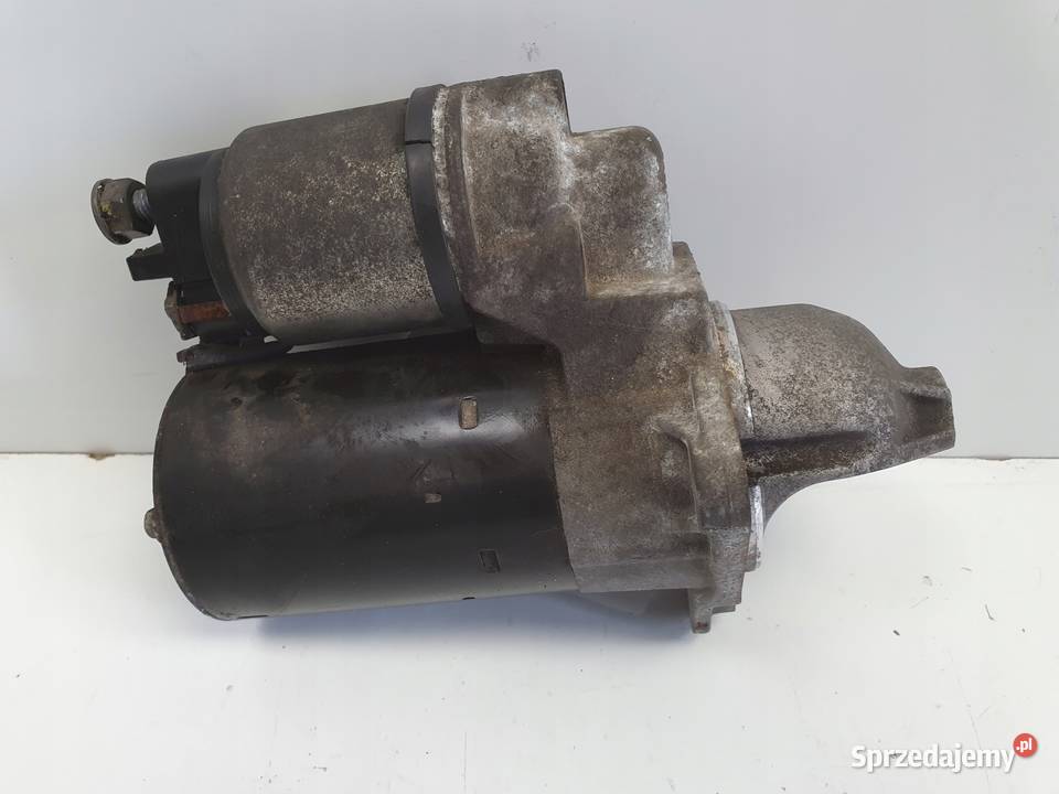 Opel Corsa D 14 16V ROZRUSZNIK bosch 0001107522 Części samochodowe Janów