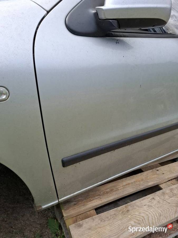 Drzwi lewy przód KOMPLETNE Seat Toledo II LS7N