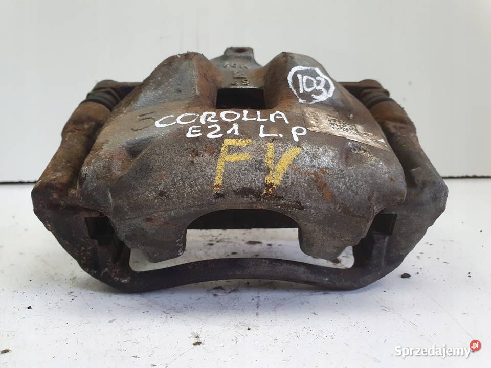 Toyota Corolla XII E21 PRAWY PRZEDNI ZACISK osobowe Rudka